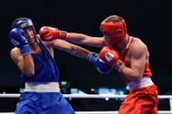 Kolesnikov of Russia in Red in action against Sagyndyk of Kazakhstan in Blue (Image Courtesy: AIBA)